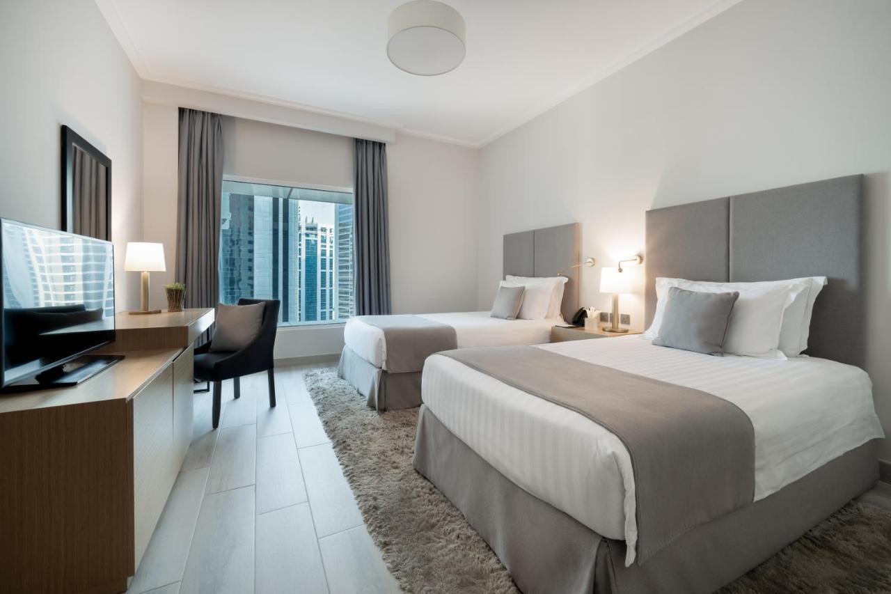 Centara West Bay Hotel & Residences Ντόχα Εξωτερικό φωτογραφία A typical guest room at the hotel